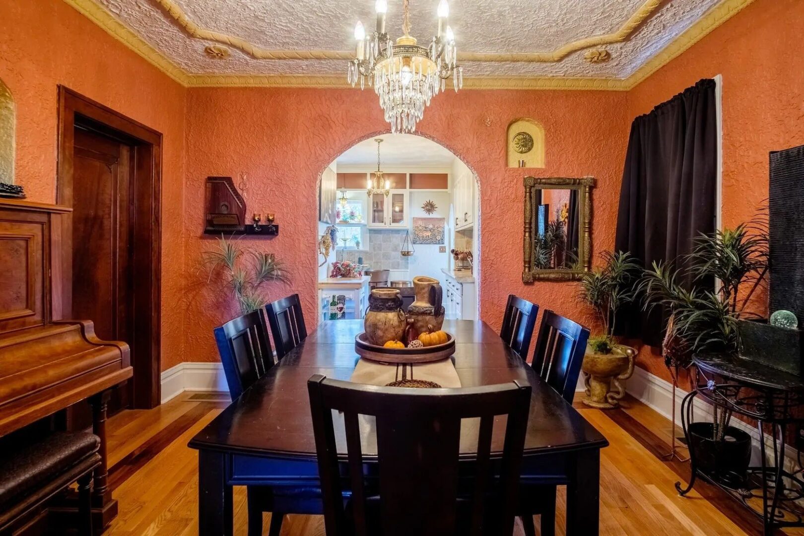 A dining room table with chairs around it